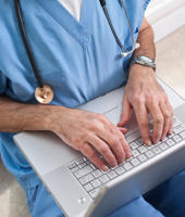 Doctor using laptop (1)