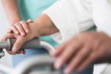 Elderly person with healthcare worker