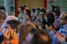 Event attendees clapping