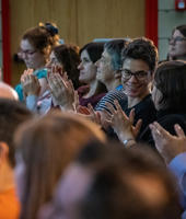 Event attendees clapping